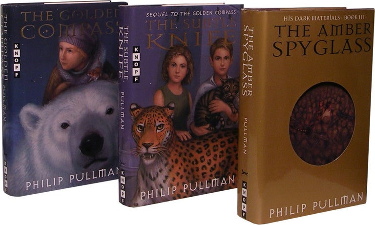 Item #50611 THE GOLDEN COMPASS, THE SUBTLE KNIFE and THE AMBER SPYGLASS. His Dark Materials; Books One, Two and Three. Philip Pullman.